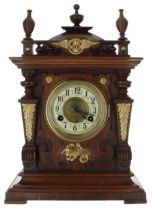 German walnut two train mantel clock striking on a gong, the 3.75" dial enclosing a recessed gilt