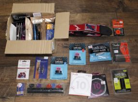 Selection of guitar accessories to include Strings by Fender Ernie Ball and D'Addario; also a Fender