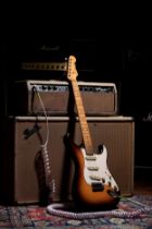 1957 Fender Stratocaster electric guitar, made in USA; Body: two-tone sunburst finish, checking