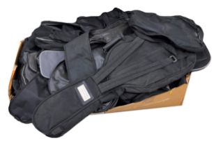 Approximately twenty-five various gig and soft guitar bags