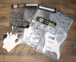 Quantity of guitar pickguards and related items to include Strat type scratchplates, pearloid