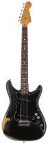 Fender Lead II electric guitar, made in USA, circa 1980; Body: black finish, large patches of finish