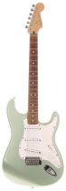 2001 Fender Standard Stratocaster electric guitar, made in Mexico; Body: metallic mint, paint chip