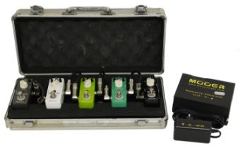 Mooer pedal flight case enclosing five Mooer guitar pedals to include a Shimverb, a Reecho, a Mod