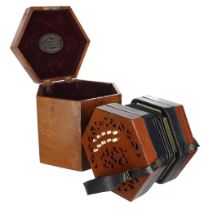 Lachenal & Co two row Anglo concertina, with twenty bone buttons on pierced wooden ends and brass