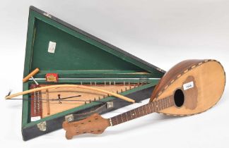 Contemporary psaltery labelled John the Spy, 95 Inverness Place, Roath, Cardiff CF2 4RW, within a