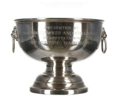 Silver pedestal bowl, with lion mask and swing ring handles, bearing a presentation inscription of