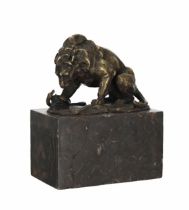 After Louis Albert Carvin (French 1875-1951) - a bronze figural study of a lion and serpent,