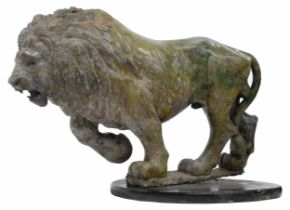 Jonah Runyanga - an impressive large carved stone sculpture of a lion, modelled prowling,