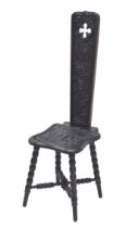 Victorian Welsh carved oak spinning chair, decorated with foliate relief, on bobbin turned legs