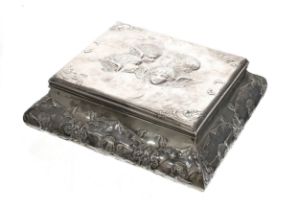 Late Victorian silver casket, the hinged cover with repousse Reynolds Angels portrait and gilded