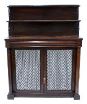 Victorian rosewood chiffonier, the raised shelved back over a long cushion frieze drawer and two