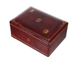 Liberty & Co. red leather jewellery box, the hinged cover decorated with three crests and a tooled