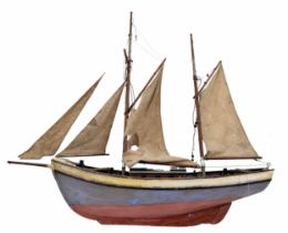 Large wooden model two masted Ketch coaster sailing boat, with a half painted hull and cabin