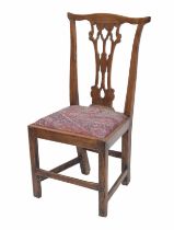 Georgian elm dining chair, the shaped pierced splat back over upholstered drop-in seat raised on