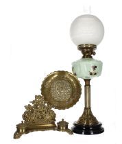 Victorian brass column oil lamp, with a floral decorated glass reservoir and etched decorated