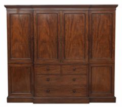 Fine and impressive Victorian mahogany breakfront wardrobe, the stepped cornice over a central