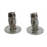 Pair of novelty silver owl menu holders by Sampson Morden & Co., with glass eyes, hallmarked Chester