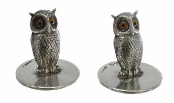 Pair of novelty silver owl menu holders by Sampson Morden & Co., with glass eyes, hallmarked Chester