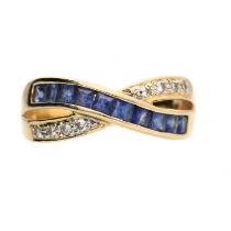 14ct yellow gold sapphire and diamond cross-over dress ring, with calibrated sapphires and round