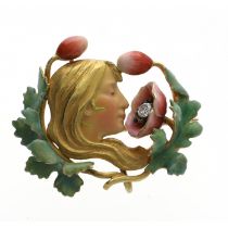 Fine Art Nouveau gold and enamel diamond set brooch, modelled with a maiden's head profile in a
