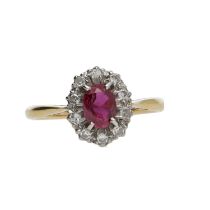 Pretty 18ct yellow gold oval ruby and diamond cluster ring, the ruby 0.65ct approx, 11mm x 9mm, 2.