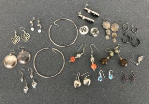 Mixed selection of assorted silver earrings