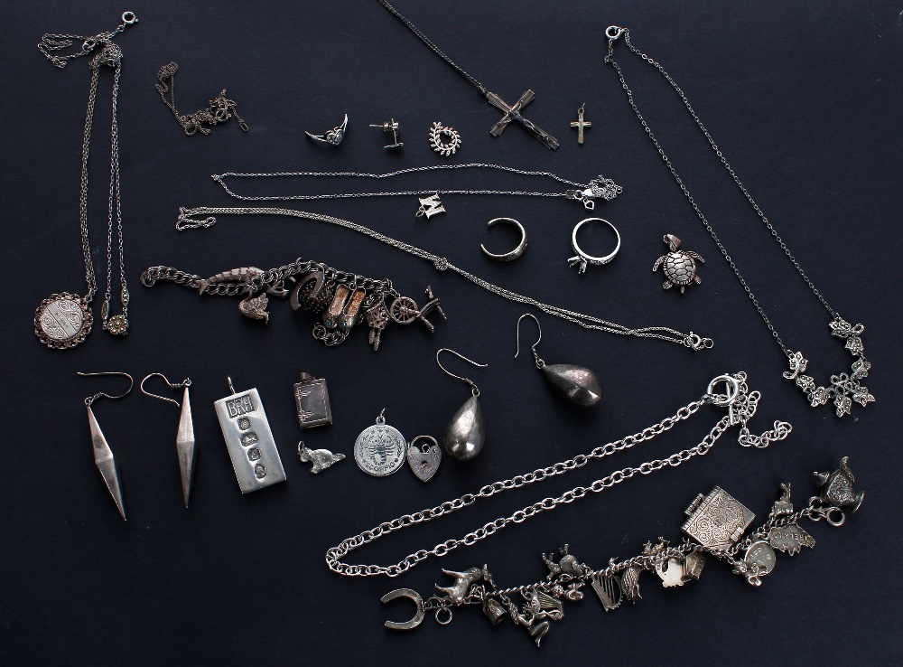 Silver jewellery various to include charm bracelets, silver ingot, earrings, etc, 170gm