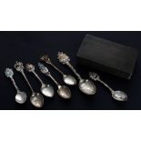 Group of seven Sterling and Continental silver souvenir teaspoons with enamelled crested finials;