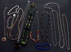 Group of 925 silver necklaces, bracelets and pendants on chains; together with some costume bead