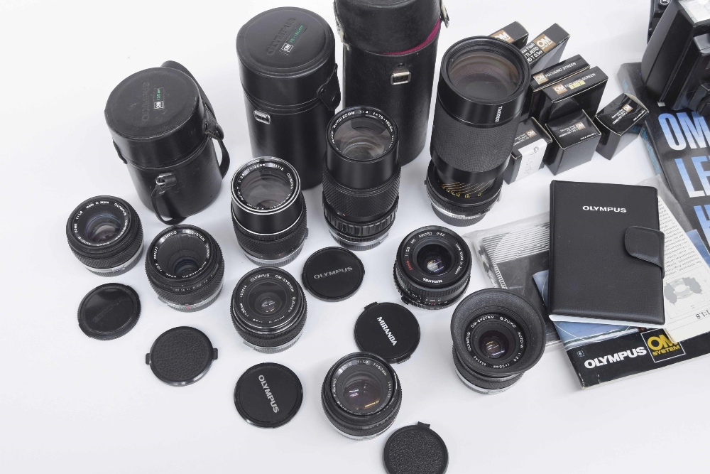 Group of Olympus camera equipment and lenses, including; lens Auto-Zoom 1:4 f+75-150mm, made in - Image 2 of 2