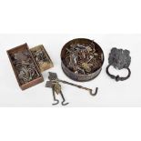 Box of assorted old keys; together with a lion head door knocker, hooks and latches etc