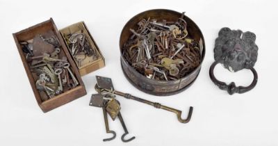 Box of assorted old keys; together with a lion head door knocker, hooks and latches etc