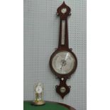 Victorian rosewood onion top four glass wheel barometer, 42" high; together with a Kundo brass