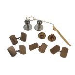 Pair of 9ct engine turned cufflinks, 7.7gm; two 9ct shirt studs, 2.2gm; 9ct tie slide, 2.6gm; pair