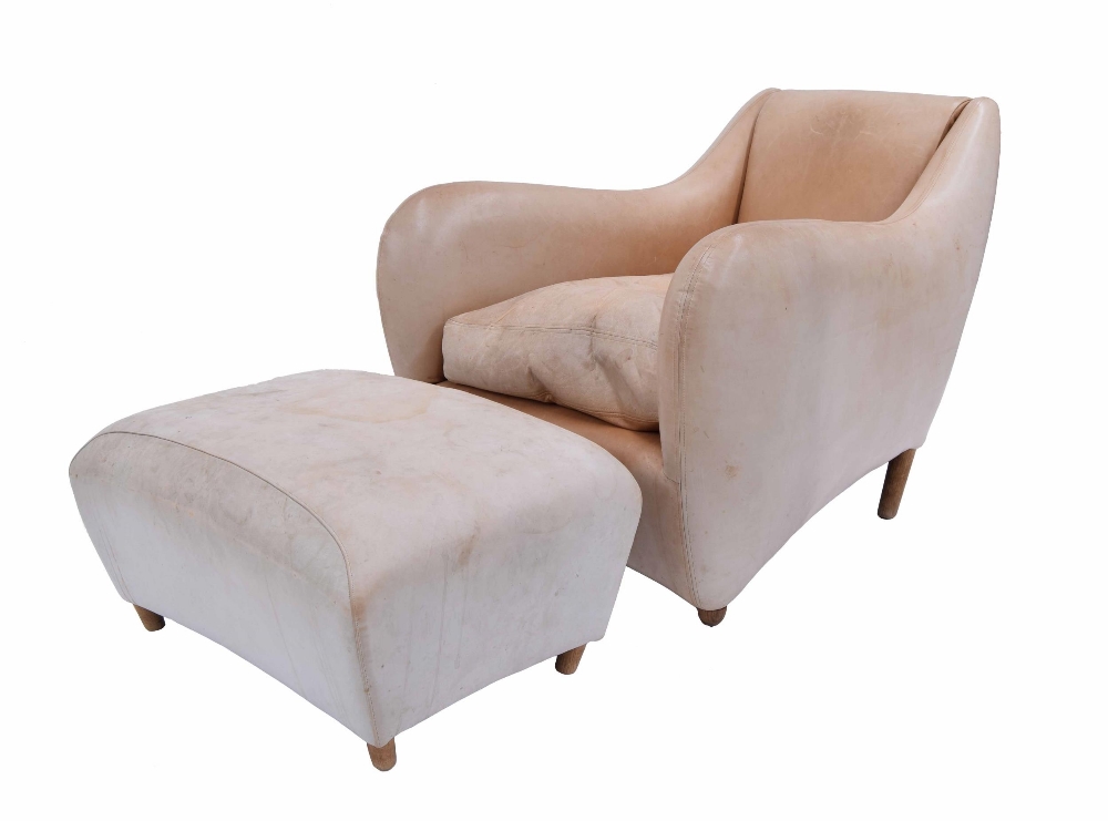 Matthew Hilton tan leather upholstered 'Balzac' lounge chair and footstool, the chair 32" wide,
