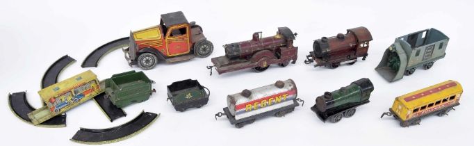 Small group of assorted early clockwork tin plate steam trains and rolling stock, including Hornby