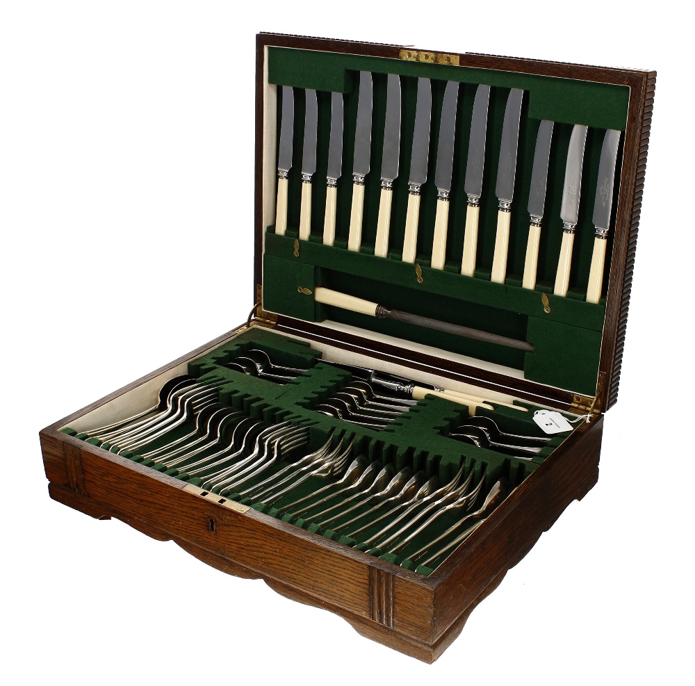Six place setting canteen of R F Mosley Ltd. EPNS/stainless cutlery, within an oak canteen case