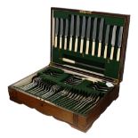 Six place setting canteen of R F Mosley Ltd. EPNS/stainless cutlery, within an oak canteen case