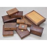Marquetry inlaid treen caddy, the hinged cover enclosing an open interior, 9" wide, 5.5" high;
