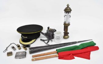 Group of interesting railwayana; a Guard's peaked cap, three G.W.R whistles and an S.D.J Ry whistle,