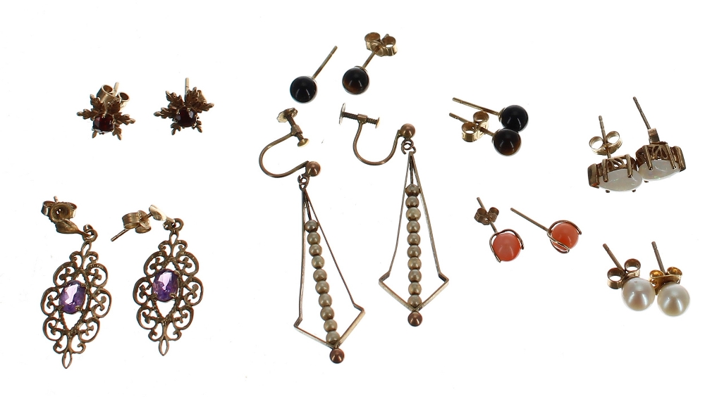 Eight assorted pairs of gold earrings to include seed pearls, tiger's eye, opal, coral, etc, 10.
