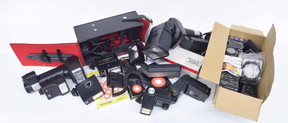 Camera flashes and accessories, including a Metz 45CT-4 in fitted case with accessories; Canon