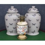 Pair of India Jane butterfly pattern pottery jars with covers, 16.5" high; together with a Duplex