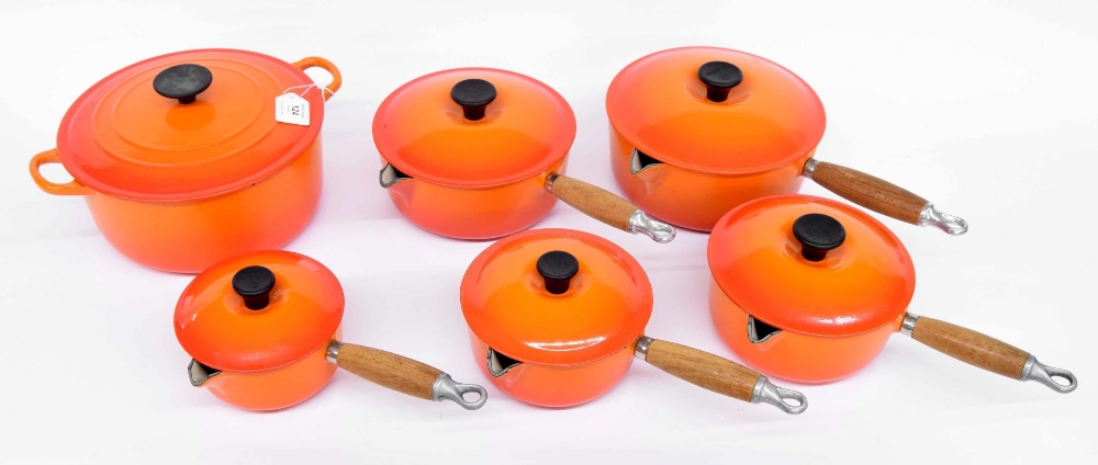Le Creuset - graduated set of five pans with lids, colour flame, sizes 22, 20, 18, 16 and 14; also a