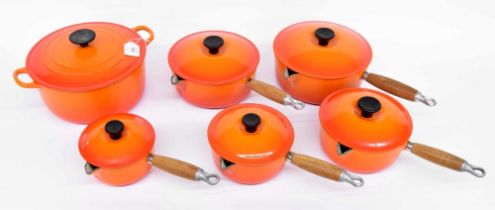 Le Creuset - graduated set of five pans with lids, colour flame, sizes 22, 20, 18, 16 and 14; also a