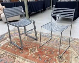 Four EMU 'Aero' painted steel dining chairs, stackable, a Paul Newman design, labelled, in grey,