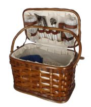 Vintage wicker picnic hamper, 11" high; the interior lined and fitted with contents including