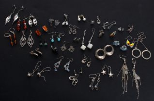 Collection of assorted earrings, primarily 925 silver