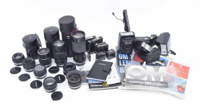 Group of Olympus camera equipment and lenses, including; lens Auto-Zoom 1:4 f+75-150mm, made in